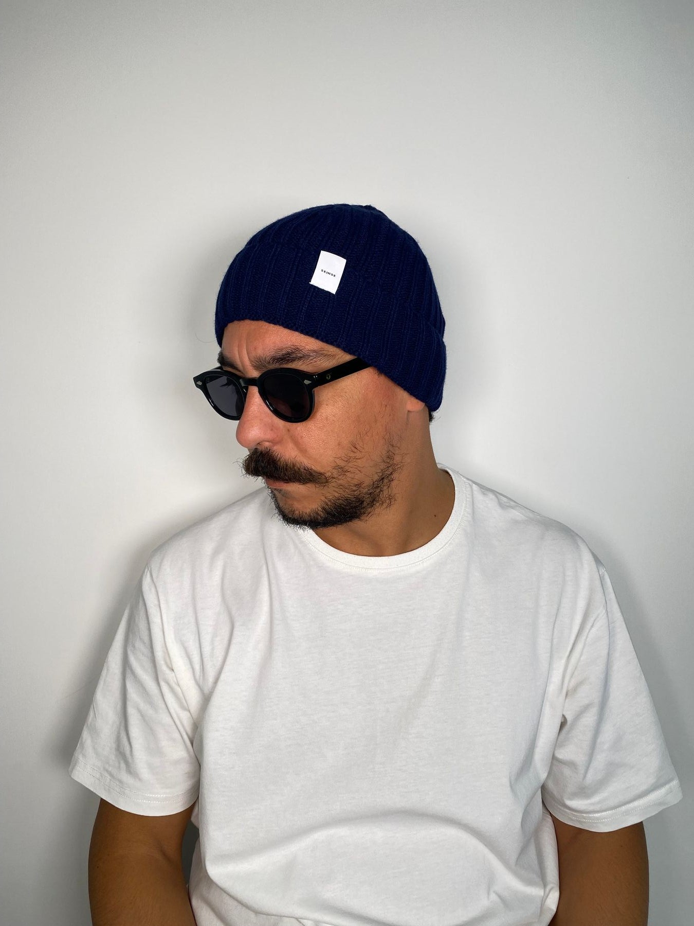CAPPELLO CON TRECCE STRETTE
