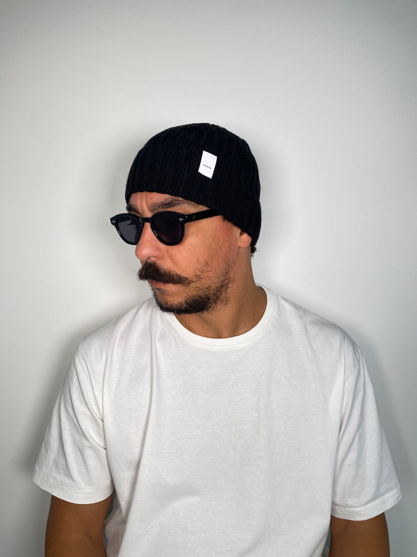 CAPPELLO CON TRECCE STRETTE