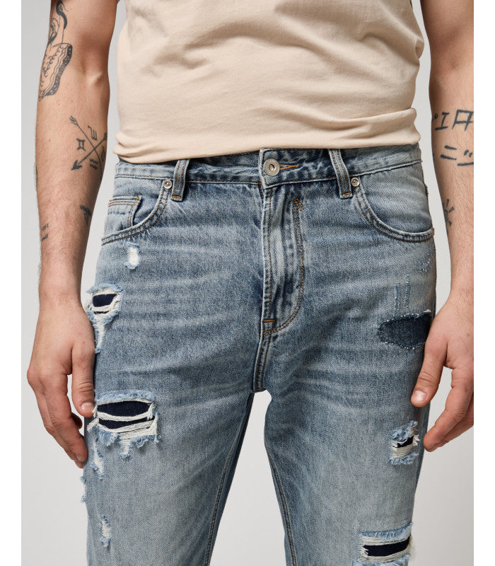 JEANS GRANT IN TELA FERMA CON MACRO ABRASIONI A TOPPA - CARROT FIT GL6339Q