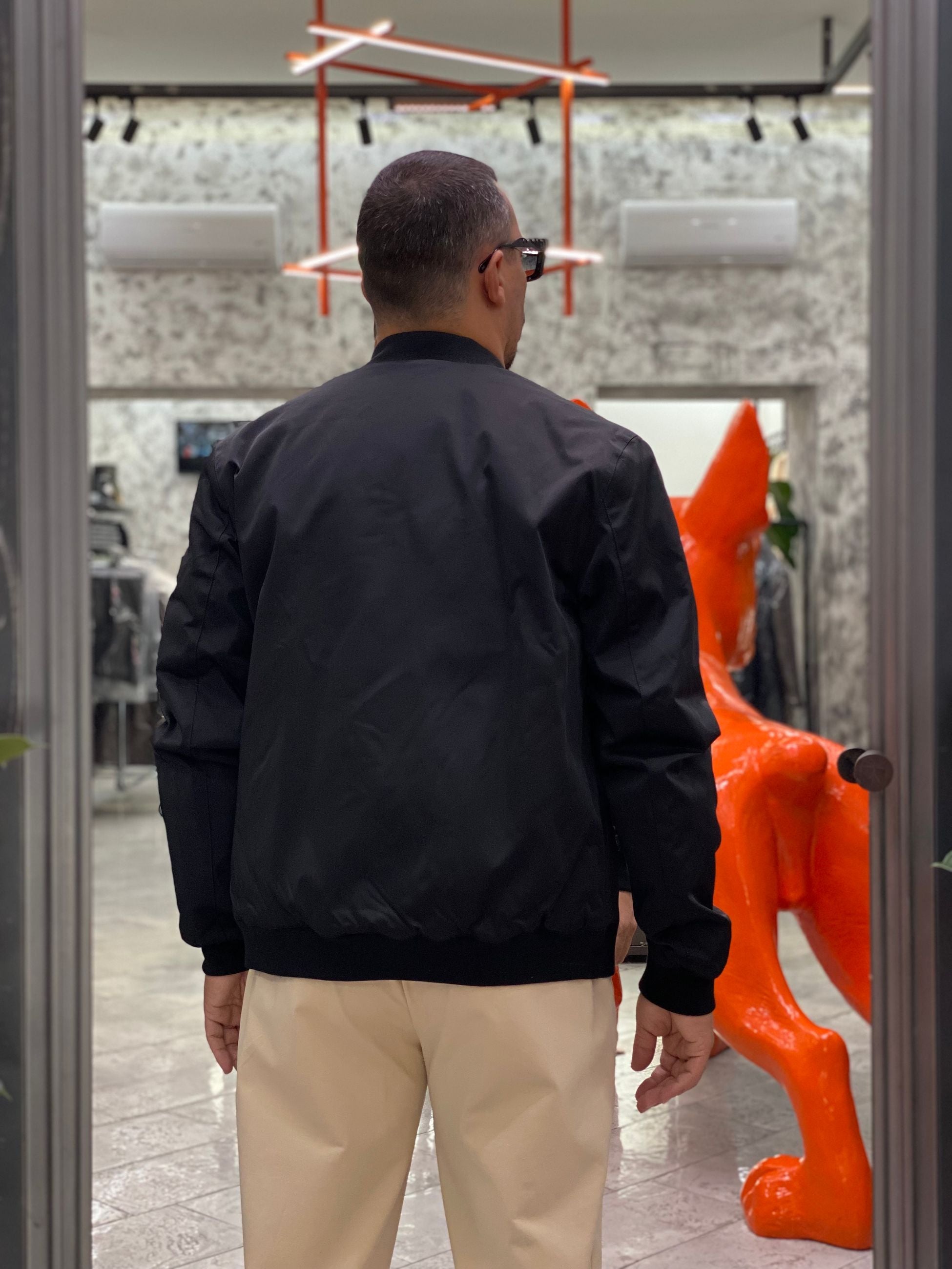 BOMBER IN NYLON MODELLO COLLEGE CON TASCHE ZIP ED ELASTICO AL FONDO - COMFORT FIT GL357R.NER
