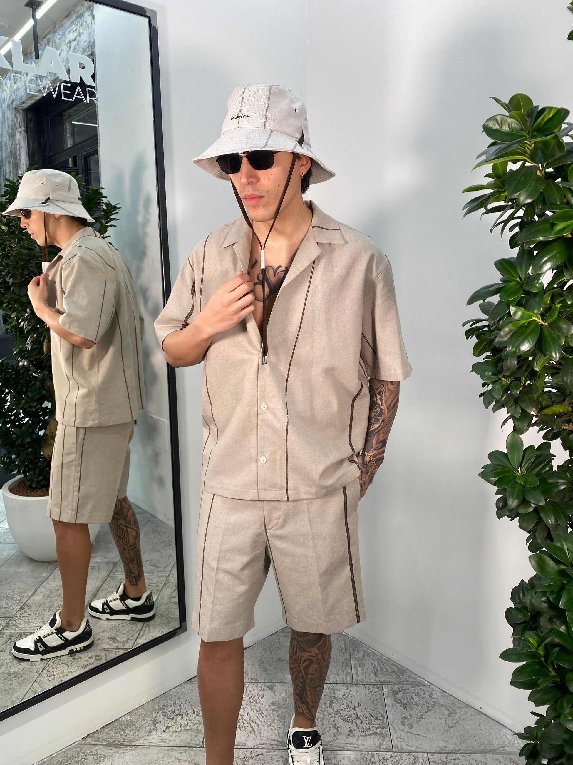 CAPPELLO BUCKET CON LACCIO MOTIVO RIGHE CAP3378
