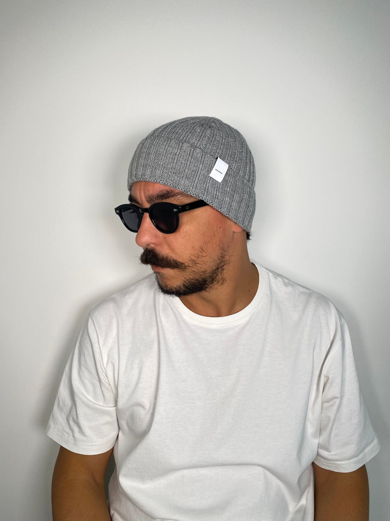 CAPPELLO CON TRECCE STRETTE