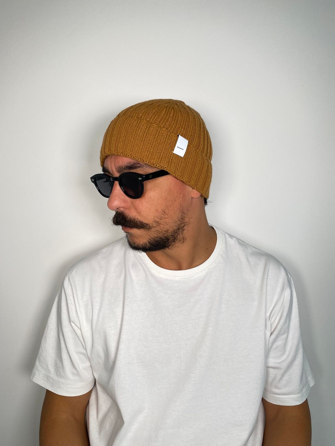 CAPPELLO CON TRECCE STRETTE