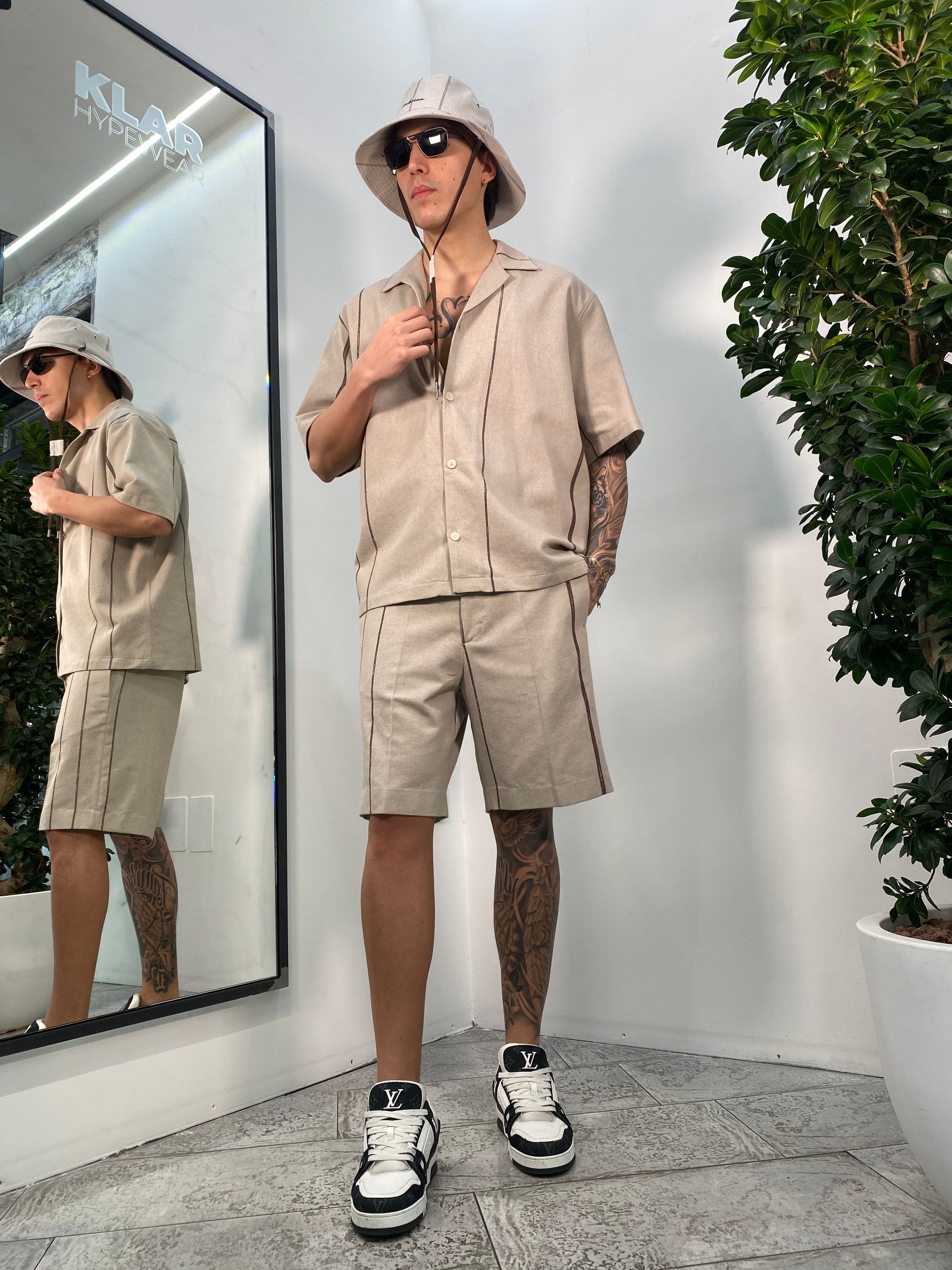 CAPPELLO BUCKET CON LACCIO MOTIVO RIGHE CAP3378