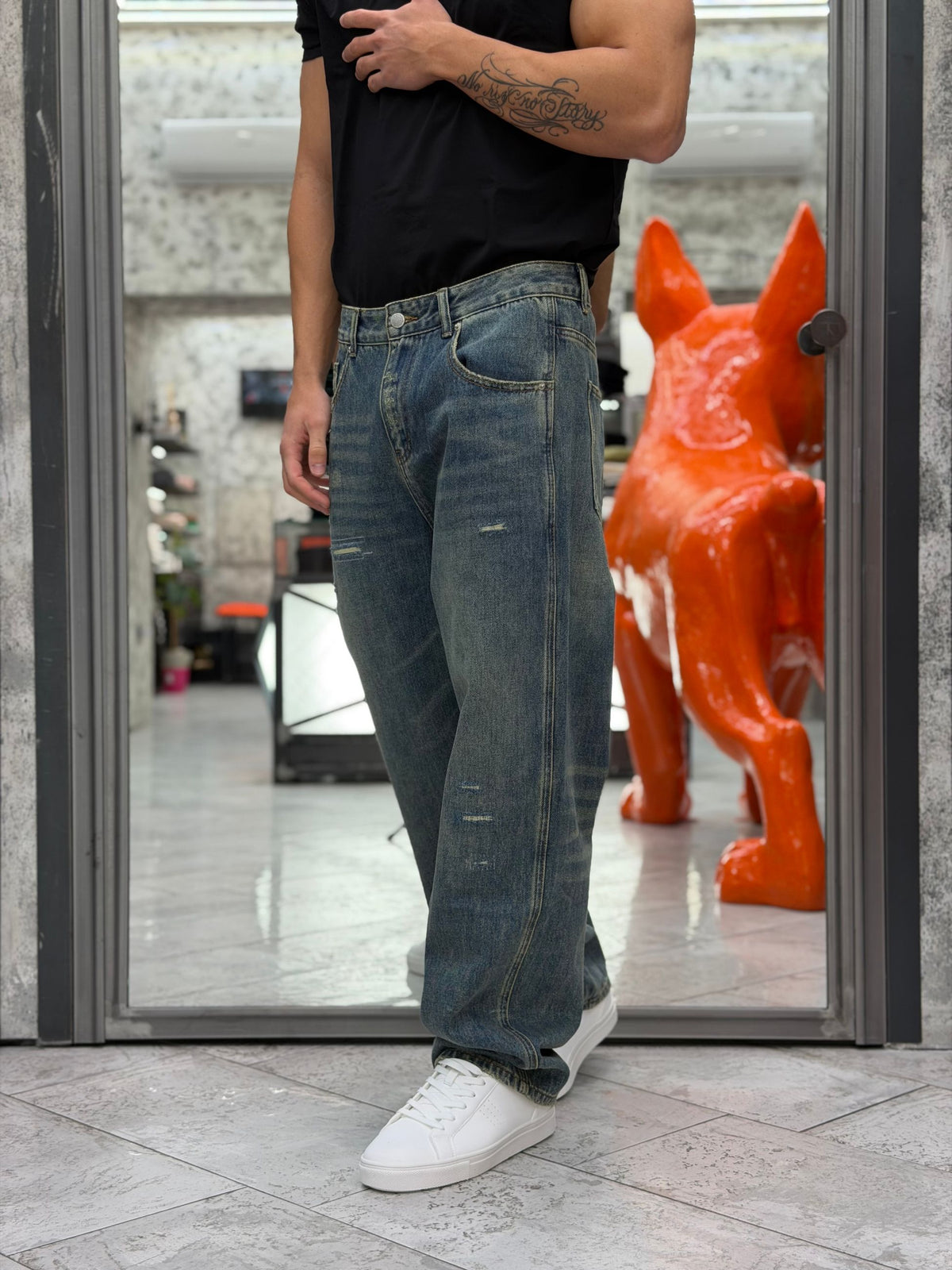 JEANS MEDIUM WASH CON SABBIATURE E MICRO ABRASIONI - WIDE LEG FIT GLW132G