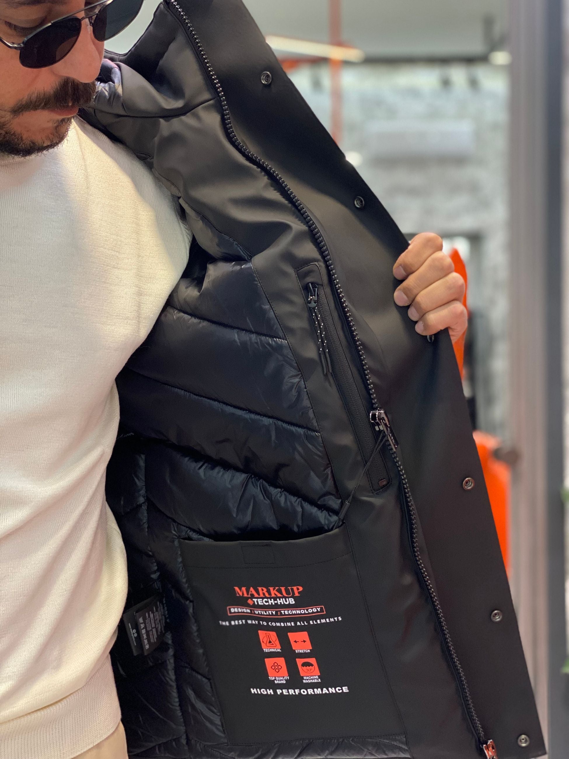 PARKA GOMMATO CON CAPPUCCIO E CHIUSURA ZIP/BOTTONI AUTOMATICI. STRETCH AND TECHNICAL - REGULAR FIT MK9940025.NER