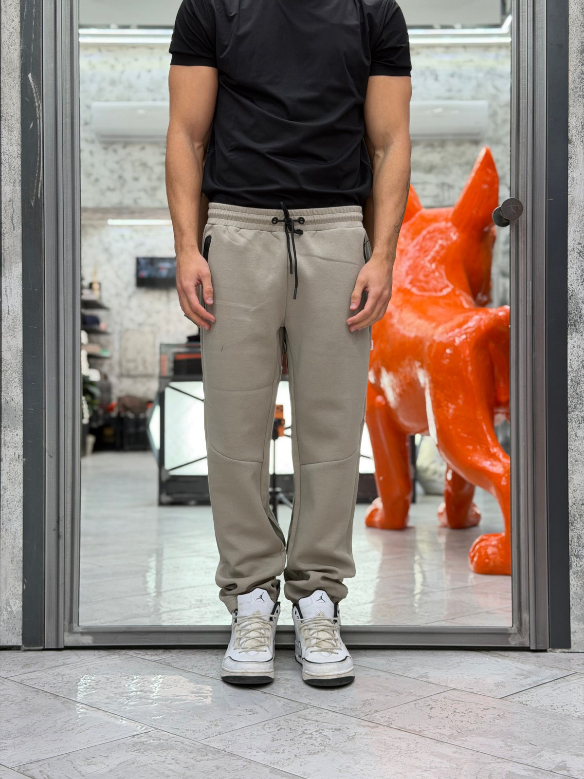 PANTALONE IN TESSUTO TECNICO INTERLOCK CON TASCHE ZIPPATE ED ELASTICO AL FONDO - REGULAR FIT MK2920078.TOR