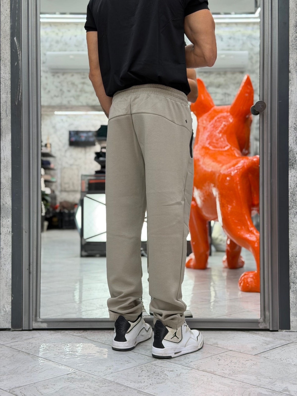PANTALONE IN TESSUTO TECNICO INTERLOCK CON TASCHE ZIPPATE ED ELASTICO AL FONDO - REGULAR FIT MK2920078.TOR