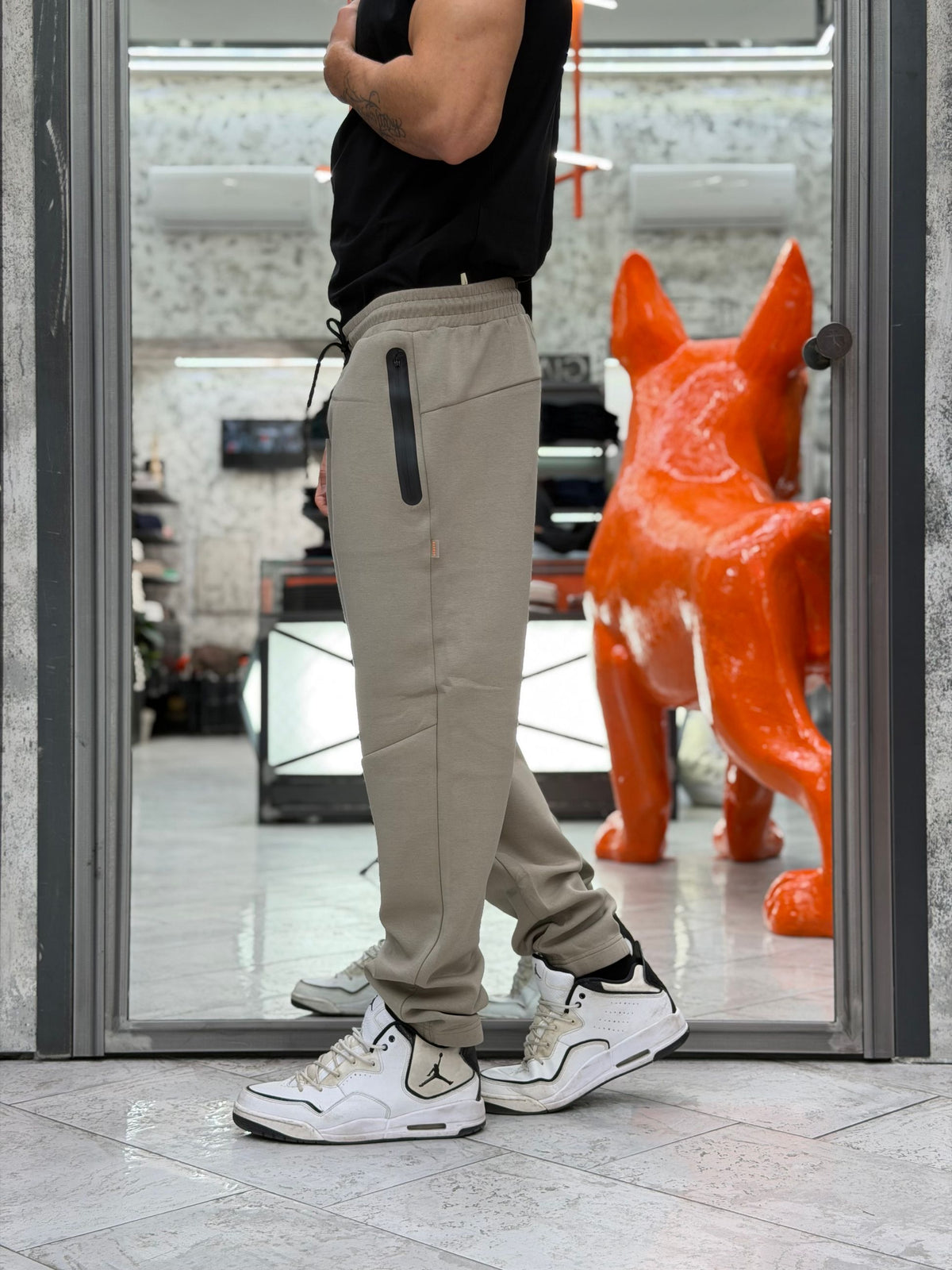 PANTALONE IN TESSUTO TECNICO INTERLOCK CON TASCHE ZIPPATE ED ELASTICO AL FONDO - REGULAR FIT MK2920078.TOR