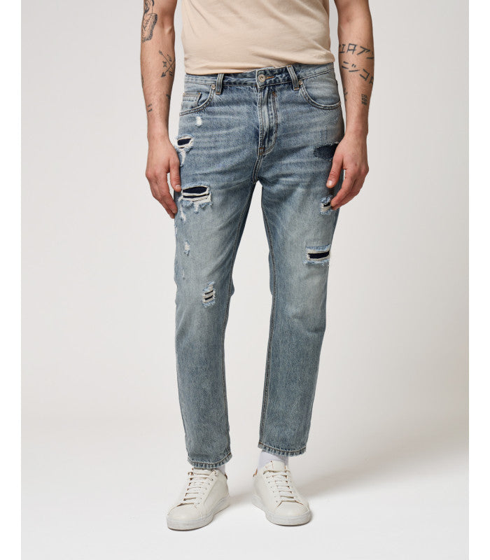 JEANS GRANT IN TELA FERMA CON MACRO ABRASIONI A TOPPA - CARROT FIT GL6339Q