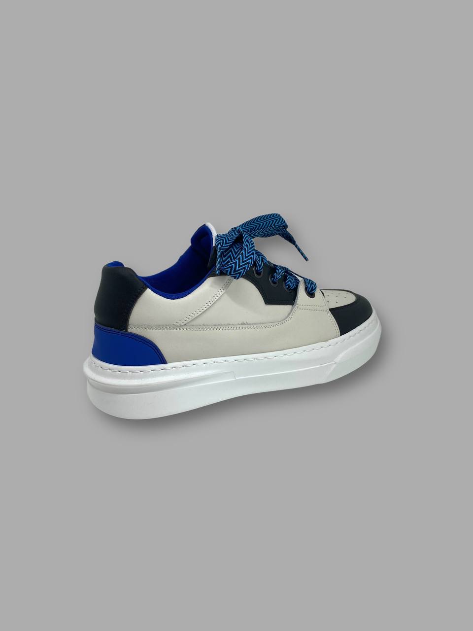 SNEAKERS IN PELLE CON SUOLA OVERSIZE E LACCI FANTASIA MODELLO LANVIN