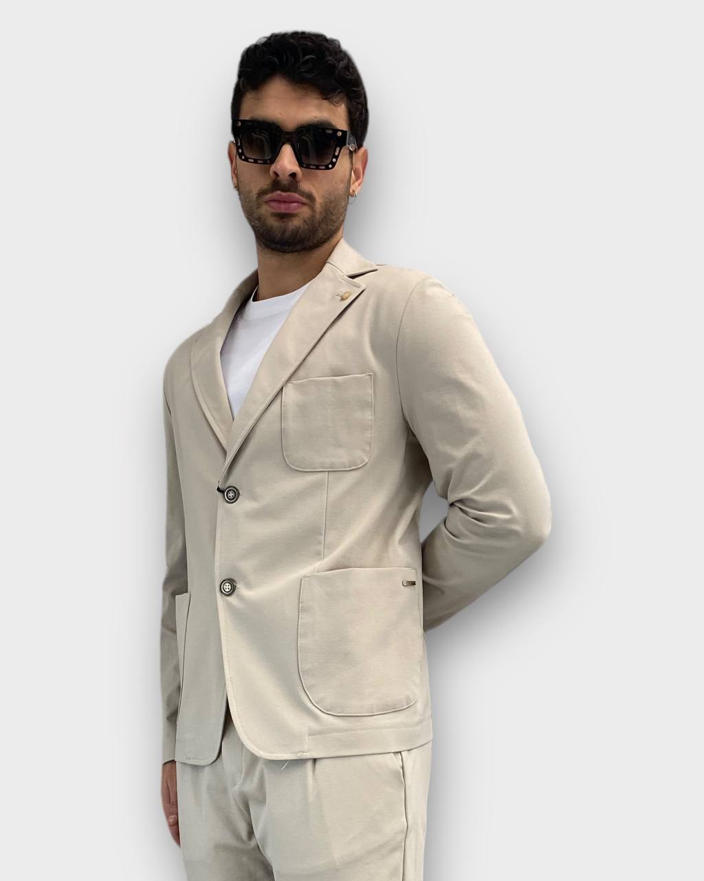 GIACCA DA ABITO MONOPETTO IN TESSUTO PUNTO MILANO ELASTICIZZATO CON TASCHE A TOPPA - SLIM FIT