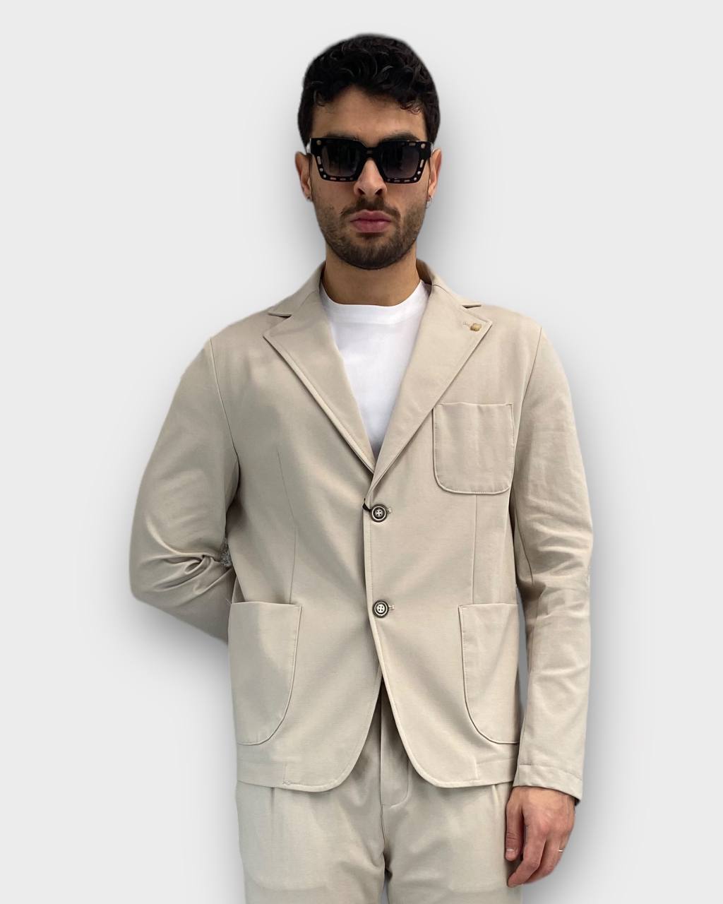 GIACCA DA ABITO MONOPETTO IN TESSUTO PUNTO MILANO ELASTICIZZATO CON TASCHE A TOPPA - SLIM FIT