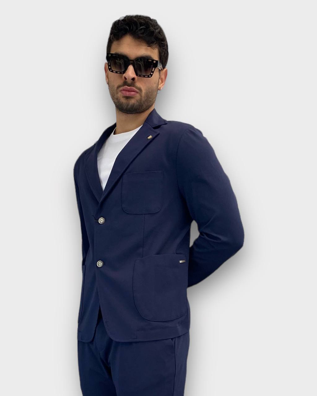 GIACCA DA ABITO MONOPETTO IN TESSUTO PUNTO MILANO ELASTICIZZATO CON TASCHE A TOPPA - SLIM FIT